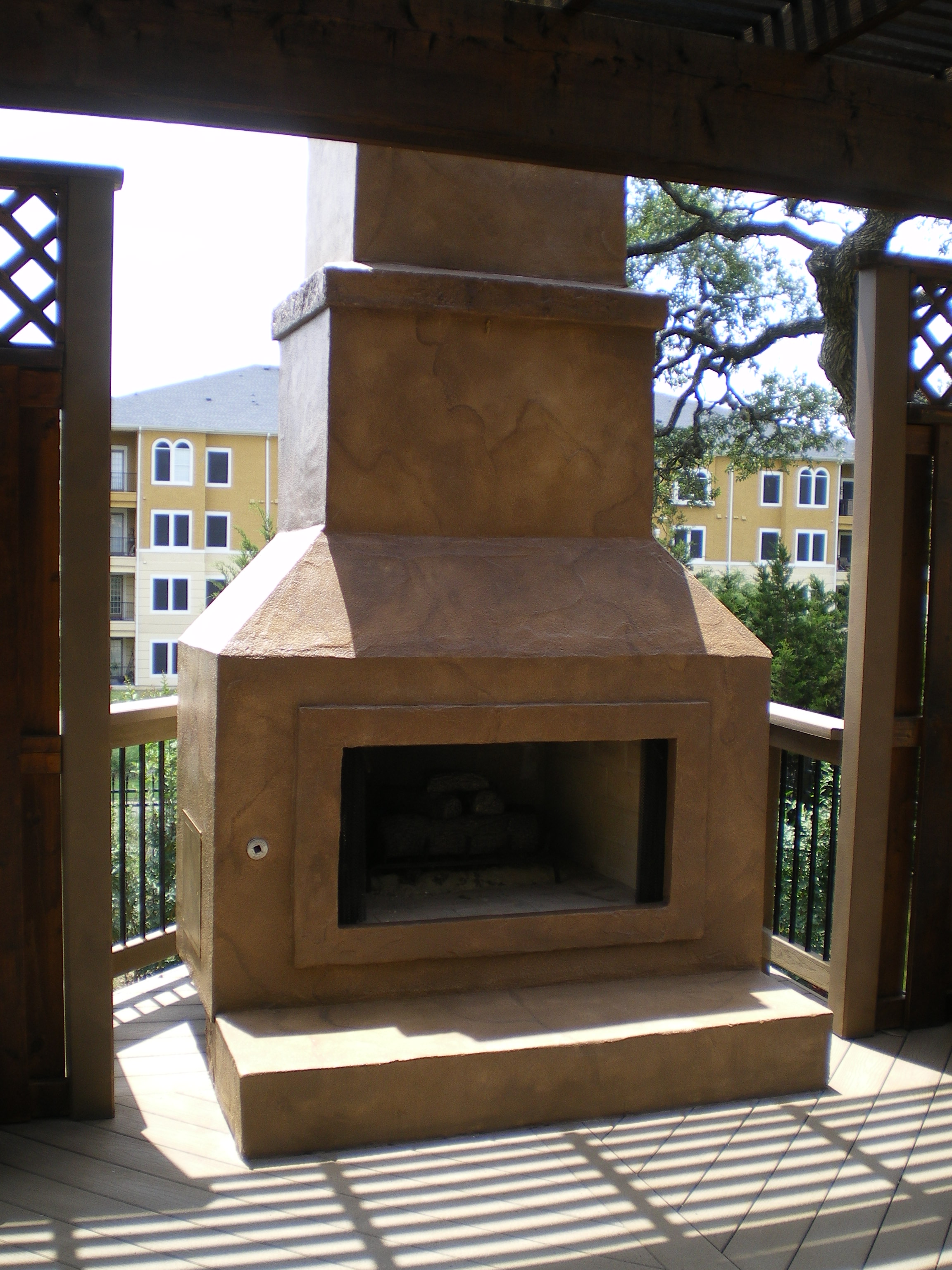 San Antonio, TX., Outdoor Patio Deck Fireplace in Faux Stone Look